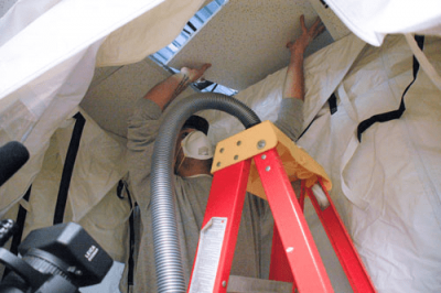 Programs-Training-TrainingCenters-min Man on Ladder with Mask